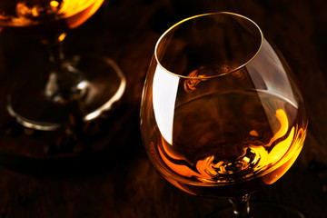 Armagnac, French grape brandy, strong alcoholic drink. Still life in vintage style, selective focus