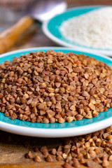 Healthy diet superfood buckwheat groats and flour used for making delicious pasta, noodles, pancaces and kasha in many countries.