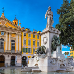 Nice in France, place Garibaldi, colorful facade, with typical murals windows, and the fountain