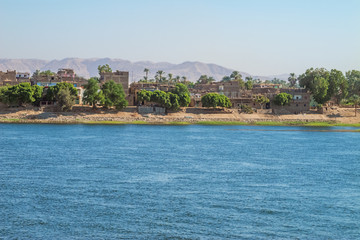 Fototapeta na wymiar Houses along the Nile in the vicinity of Al Maris