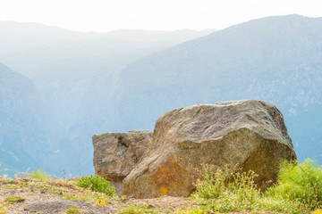 Scenic landscape of green hills and rocky mountains of the island of Sardinia in spring