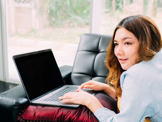 Asian woman self study electronic learning at home.