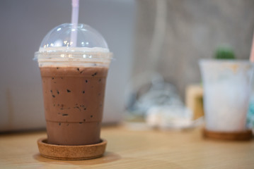 cup of coffee on wooden table