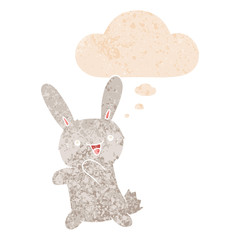 cartoon rabbit and thought bubble in retro textured style