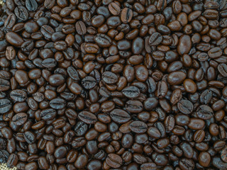 coffee beans on burlap background