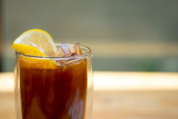 Glass of espresso shot mixed with orange juice