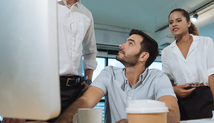 Obraz premium Business people are meeting in office city building view. Group of Business team working and share ideas about project to partners