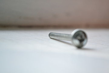 screwdriver and screws on a white background