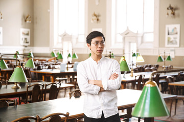 Confident asian man student standing