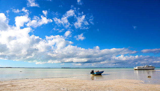 Shallow water with a beached boat in the Bahamas