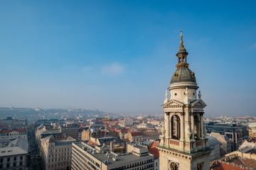 Fototapeta na wymiar Tower of the St. Stephen's Basilica and aerial cityscape