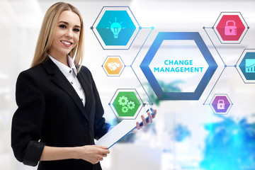 The concept of business, technology, the Internet and the network. A young entrepreneur working on a virtual screen of the future and sees the inscription: Change management