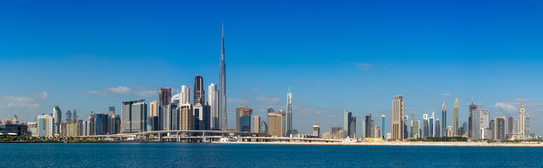 Super high resolution Wide panorama of Dubai cityscapes with Burj Khalifa at daytime