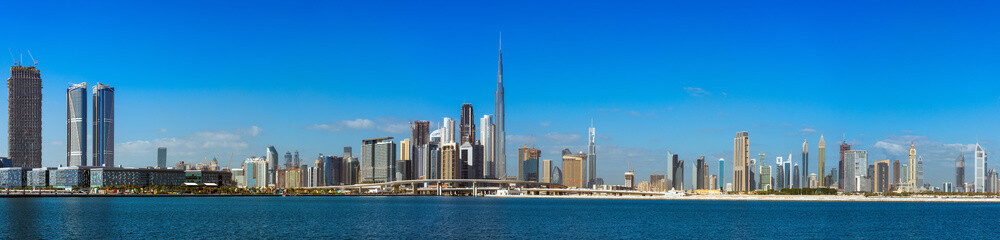 Fototapeta na wymiar Super high resolution Wide panorama of Dubai cityscapes with Burj Khalifa at daytime