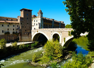 Fototapeta na wymiar The Pons Fabricius or Ponte dei Quattro Capi, is the oldest Roman bridge in Rome, Italy