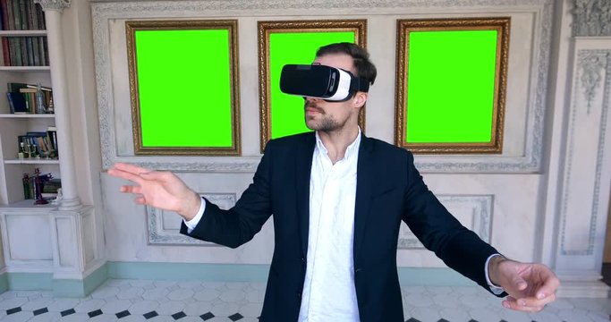 Man in museum using virtual reality glasses