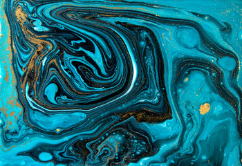 Blue and gold marbling pattern. Golden marble liquid texture.