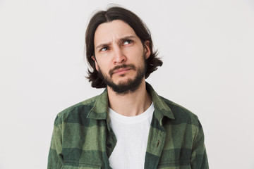 Portrait of a young bearded man wearing casual clothes