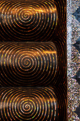 Fototapeta premium Feet Detail of Reclining Buddha Golden Statue Wat Pho Bangkok Thailand