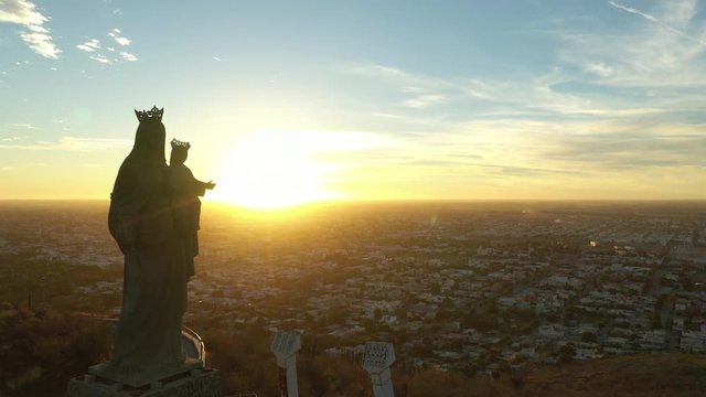 Aerial Drone Sunset View over Cerro de la Memoria and the Virgin in Los Mochis, Sinaloa, Mexico