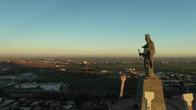 Aerial Drone Sunset View over Cerro de la Memoria and the Virgin in Los Mochis, Sinaloa, Mexico