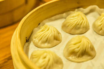 chinese Traditional style dumplings in bamboo tray display