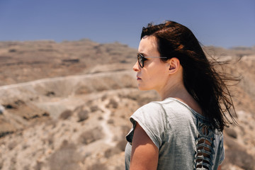 Young woman wearing sunglasses on holidays in Canary Island, Gran Canaria, Spain.