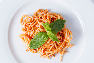 Spaghetti bolognese on white plate