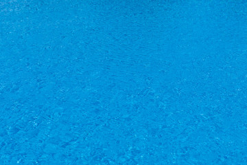 Fototapeta na wymiar Clean water in a blue pool