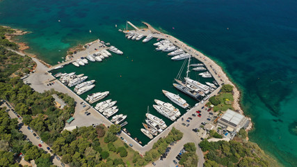 Aerial drone photo of famous luxurious Lemos peninsula in Vouliagemeni area with iconic celebrity...