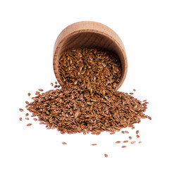 flax seeds in wooden bowl on white background isolation