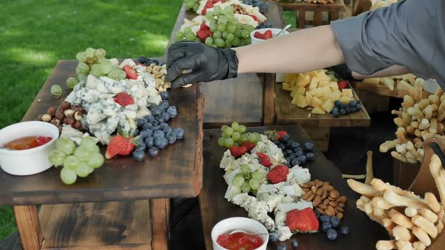 Assorted natural and healthy Organic Cheese Gauda Parmesan Cheder and fruits and nuts for a feast of young Wine 4k