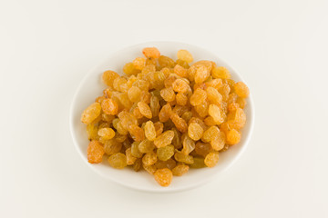 Fresh picked raisins isolated on white background