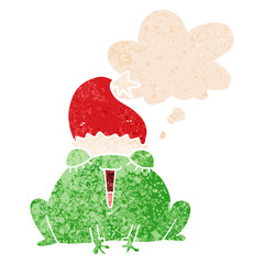 cute cartoon christmas frog and thought bubble in retro textured style