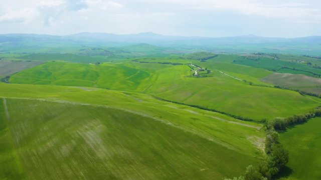 Aerial view of the Tuscany landscape in The Val d'Orcia, or Valdorcia, is a region of Tuscany, central Italy, which extends from the hills south of Siena to Monte Amiata