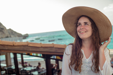 A happy young girl and a Mediterranean sea