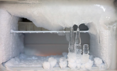 Ice crystals icebox freezer in refrigerator - obrazy, fototapety, plakaty