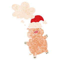 cartoon happy christmas pig and thought bubble in retro textured style