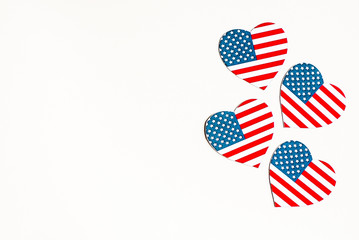 American Independence day background with blue, white and red mixed stars and hearts. Celebration of American independence day, the 4th of July (the Fourth of July). Holiday concept. With copy space. 