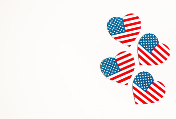 American Independence day background with blue, white and red mixed stars and hearts. Celebration of American independence day, the 4th of July (the Fourth of July). Holiday concept. With copy space. 