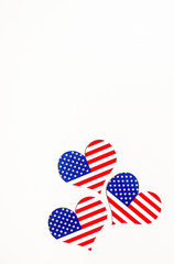 American Independence day background with blue, white and red mixed stars and hearts. Celebration of American independence day, the 4th of July (the Fourth of July). Holiday concept. With copy space. 