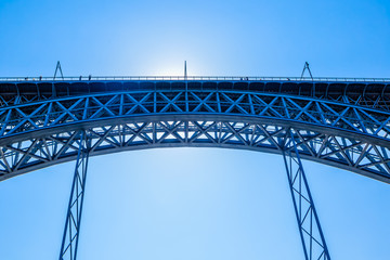 Fragment of Dom Luis I bridge in Portugal. The arched bridge from the late 19th century spans the...