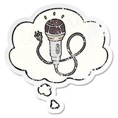 cartoon microphone and thought bubble as a distressed worn sticker