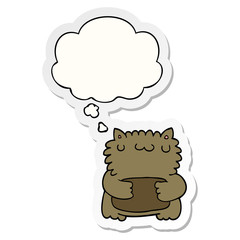 cartoon bear and thought bubble as a printed sticker