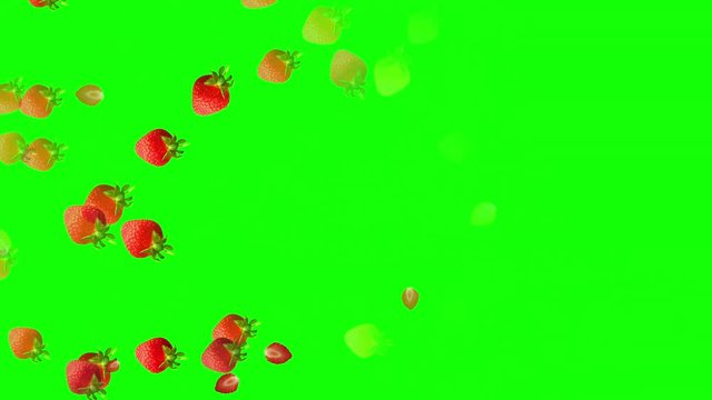 Beautiful strawberries falling down against green background. Can be used for text overlays or superimposed over your projects