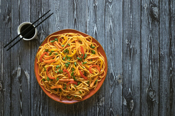 Schezwan hakka noodles. Served in a bowl. Top view