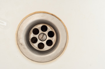 Dirty mesh sink with patina in the kitchen closeup