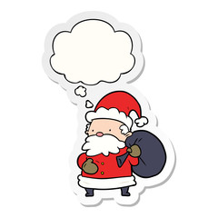 cartoon santa claus and thought bubble as a printed sticker