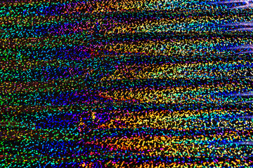 Photo of holographic real texture in rainbow colors, colorful iridescent surface. Holographic color...