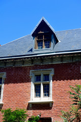 Abandoned train station with old red brick architecture